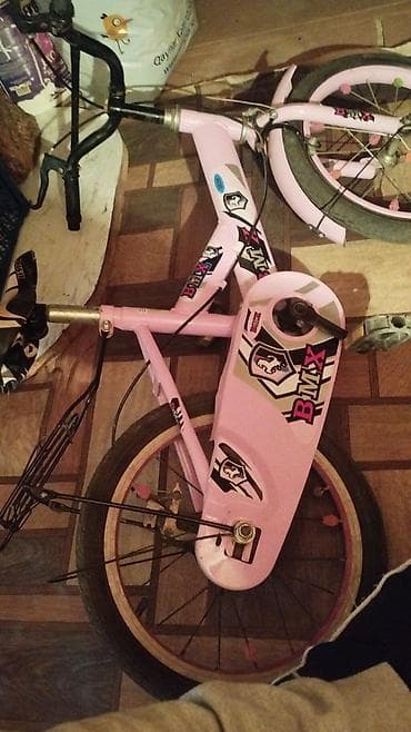 motorlu velosibed: Uşaq velosipedi – BMX üslubunda, çəhrayı rəngdə. Xüsusiyyətlər: - — 4