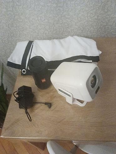 İşlənmiş Portativ Proyektor Ünvandan götürmə