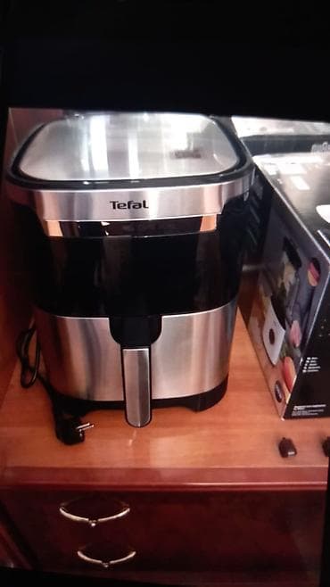 et ceken: 720 alınıb satiram 330 Tefal Easy Fry & Grill XXL hava fritözü və — 1