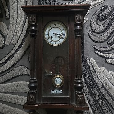 Divar saatları, Mexaniki, Mayatnik