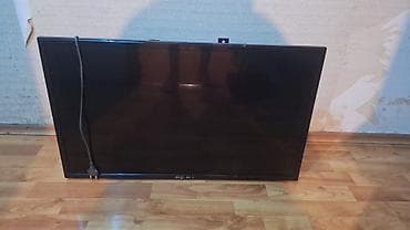 nikai televizor: LED televizor (təxminən 32–37 düym arası), divar asqısı ilə — 1