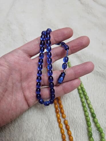 Portmone, pulqabıları: Məhsul: Təsbeh dəsti (3 ədəd) Təsvir: - Üç müxtəlif rəngdə təsbeh — 2