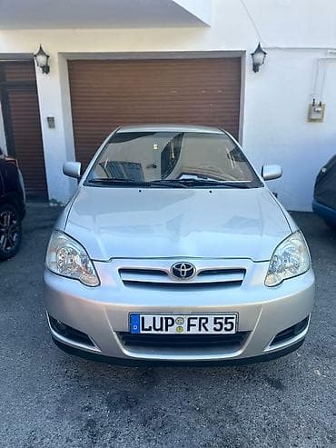 corolla cros: Toyota Corolla (E120) hatchback – gümüşü rəng Texniki və dizayn — 1