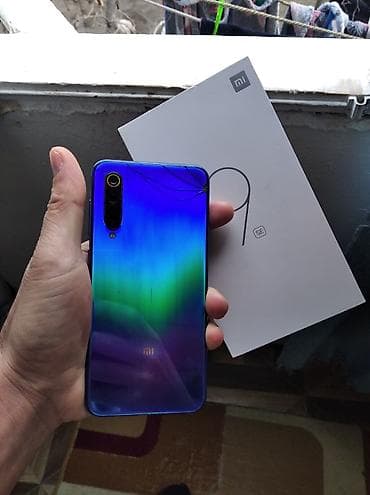 telefon nabran: Xiaomi Mi 9 SE, 128 GB, 
 Barmaq izi — 2