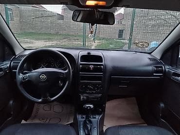 formula tekerler: Opel Astra: 1.8 l | 1999 il 250000 km Sedan — 3