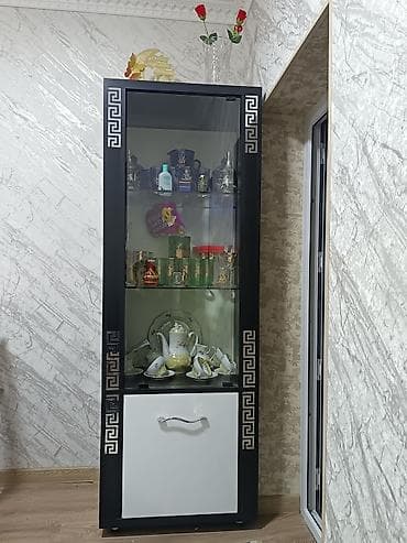 Şüşəli dolab vitrini, İşlənmiş, Ünvandan götürmə