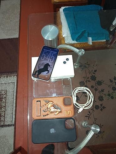 2.el macbook: IPhone 13 — 1