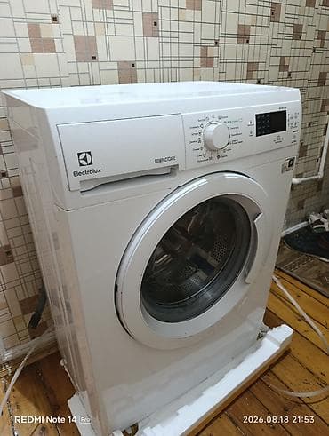 iphone 16 pro max kreditle: Electrolux CompactCare paltaryuyan maşın. Öndən yükləməli modeldir — 3