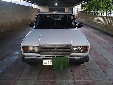 e39 guzgu: Lada 2104, ağ rəngli universal kuzov Texniki xüsusiyyətlər: - Kuzov — 2