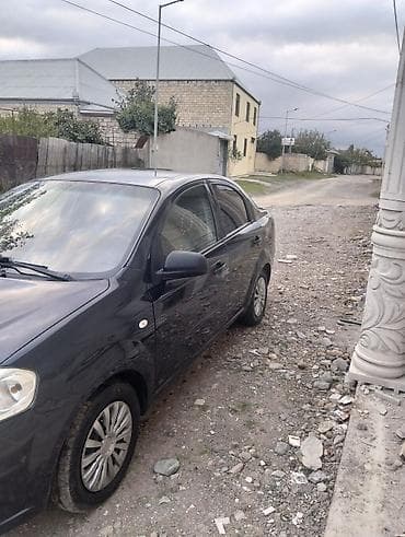 niva salon: Chevrolet Aveo sedan - Korpus: 4 qapılı sedan, qara rəng - Model — 7