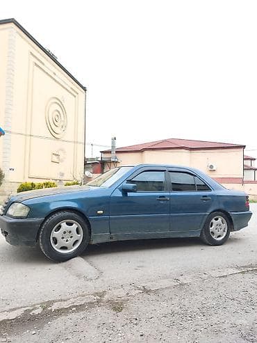 ikinci el guzguler: Mercedes-Benz sedan (W202 C-Class) - Kuzov: 4 qapılı sedan, tünd mavi — 3