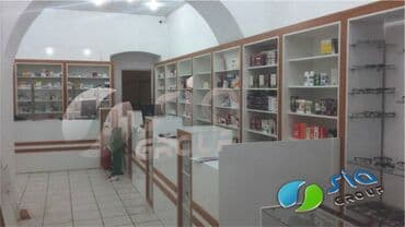 Aptek vitrin mebellərinin yığılması Sifariş sizdən vitrinləri yığmaq