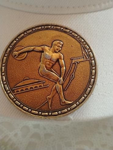1976 dollar: Sovet dövrünə aid idman mövzulu bürünc tonlu medal/nişan. - Ön — 1