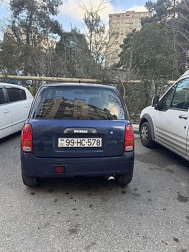 opel oturacaqlar: Kompakt şəhər avtomobili – 3 qapılı hatchback. Xarici: - Tünd mavi — 4