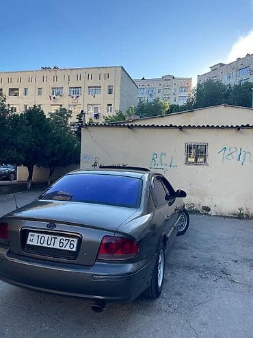 lancer stop: Hyundai Sonata sedan - Kuzov: 4 qapılı sedan, tünd boz rəng - Nömrə — 4