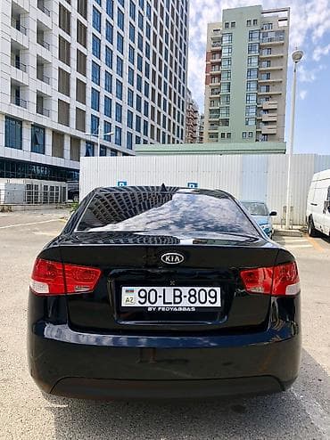 disk qabi: Kia Cerato: 1.6 l | 2011 il Sedan — 4
