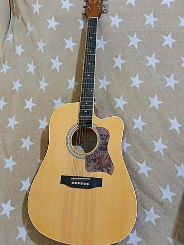 Akuistik gitara – dreadnought korpus, kəsik (cutaway) dizaynlı. - Ön