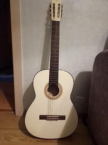 Musiqi alətləri: Akustik gitara, 6 sim, İşlənmiş — 1