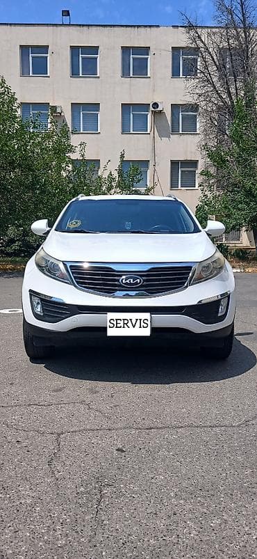 Kia Sportage: 2 л | 2013 г. Внедорожник — 1