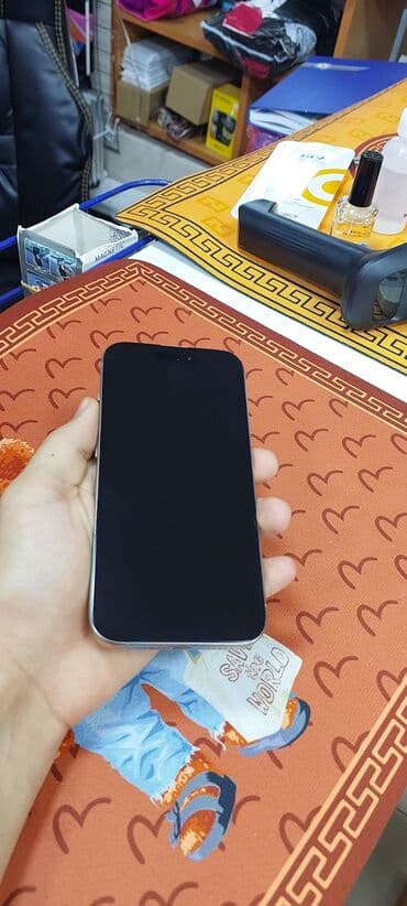 a 80 2020: IPhone 14, 128 GB, Mavi, Face ID — 15