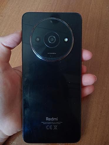 Redmi smartfon Xüsusiyyətlər: - Arxa tərəfdə dairəvi modulda AI