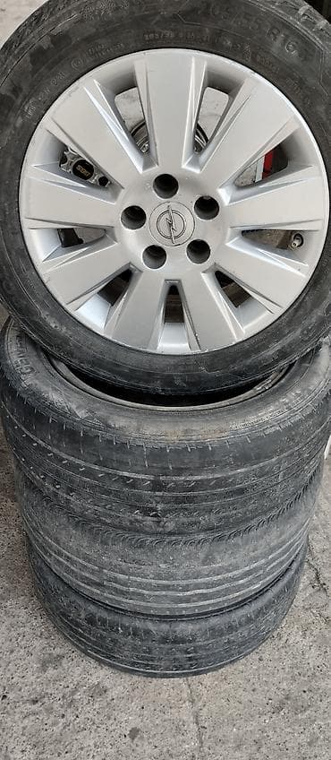 Шины и диски: Opel üçün orijinal 16" yüngül lehimli disk və 205/55 R16 ölçülü — 1