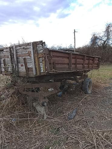 lalafo traktorlarin satisi: Kənd təsərrüfatı qoşqusu – ikioxlu, yarımörtülü bortlu tip. qabag — 3