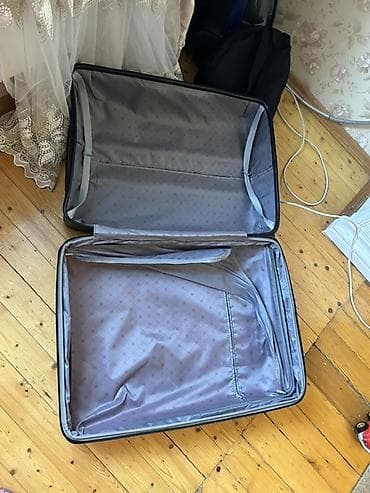 21k qizil: Seyahet camadani. 1defe iwlenib xaricden alinib. Bir tekeri yoxdur — 4