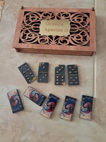 Taxta qutuda domino dəsti. - Zərif oyma naxışlı, qapağında “Oyunçu