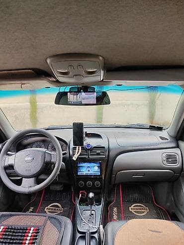 gəncə belarus zavodu: Nissan Almera Classic: 1.6 l | 2008 il Sedan — 7