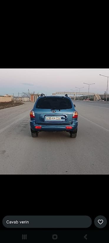 ij disklər: Hyundai Santa Fe – mavi rəngli, 5 qapılı SUV. Texniki və dizayn — 2