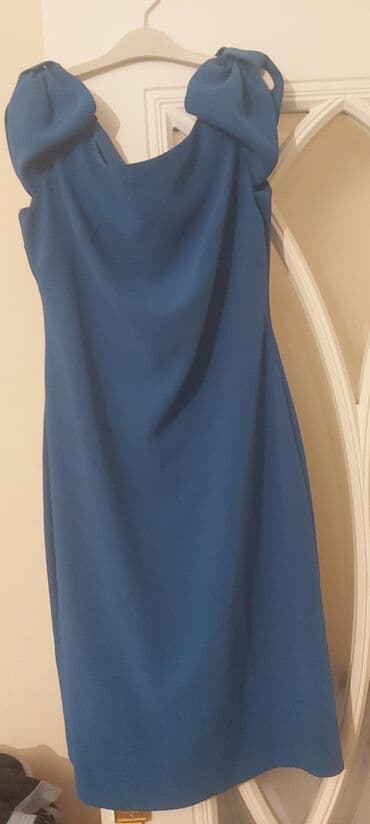 Куртки: Mavi rəngli qadın donu - Stil: Zərif və minimal dizayn, drapeli ön — 3