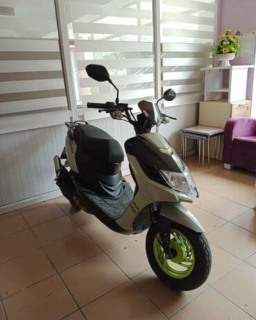 gence traktor zavodu yeni qiymetleri: Skuter – Aerox Ares model - Rəng: boz-gümüşü gövdə, qara üst panel — 1