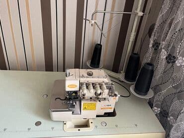 lazer yazı aparatı: Sənaye overlok tikiş maşını – JOYEE JY-8604B Xüsusiyyətlər: - 4 — 1