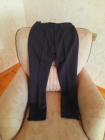 Qara klassik şalvar - Rəng: qara - Kəsim: düz, ön hissədə qatlı bəl