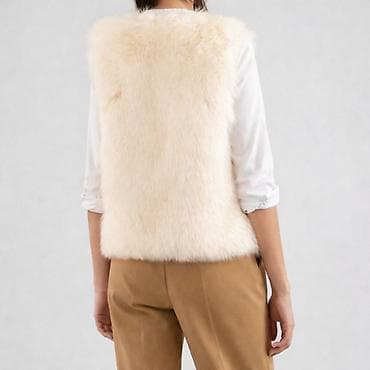 corab toxuma: Fil sümüyü rəngli süni kürk jilet, yenidir. Ölçü= M/L ölçülərinə — 2