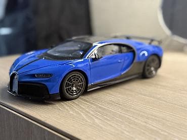 pultlu mawin: Məhsul: Radiouidarəolunan (RC) idman avtomobili modeli – mavi/qara — 4