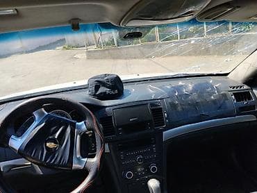 20 lik disk teker: Chevrolet Epica, ağ rəng, sedan masin otur sur masindi sekilde — 1