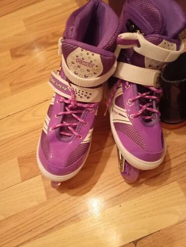 Digər idman və istirahət malları: Bənövşəyi-ağ rəngli inline (təkərli) rolliklər - Marka üzərində — 2