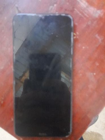 modem sim kartlı: Məhsul: Xiaomi Redmi smartfon Xüsusiyyətlər: - Arxa qapaqda “Redmi” — 2