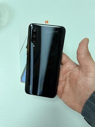 a 10 s: Xiaomi Mi 9 Lite, 64 ГБ, 
 Сенсорный, Отпечаток пальца, Две SIM карты — 6