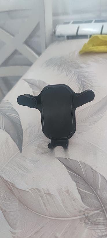 kirdit masinlar: Avtomobil üçün hava çıxışına quraşdırılan telefon tutacağı - — 2