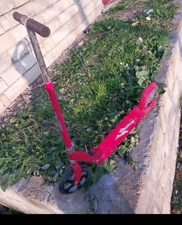 baseyn usaqlar ucun: Masallidadir .Bu qırmızı rəngli skuter, uşaqlar üçün nəzərdə — 2