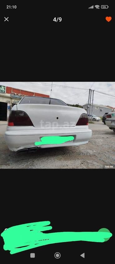 kvadrasikl satisi: Ağ rəngli sedan avtomobil Xüsusiyyətlər: - Kuzov: 4 qapılı sedan, ağ — 2