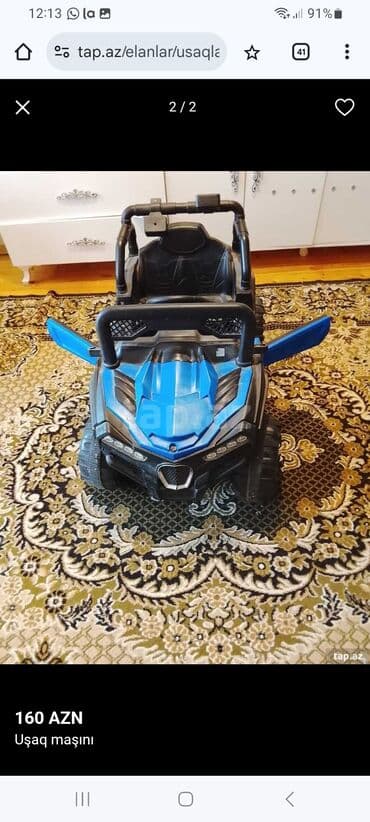 Uşaq elektromobili – mavi/qara rəngdə, təkərli off-road dizayn.uşaq