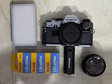 instax mini 12 en ucuz: 1979-cu il Yaponiya istehsalı. Olympus OM 10 35 mm film ilə işləyən — 6