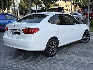 07 peredok: Hyundai Elantra: 2 l | 2009 il Sedan — 8