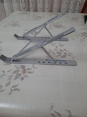 for x: Məhsul: Laptop Stand – Creative Folding Storage Bracket salam əziz — 5