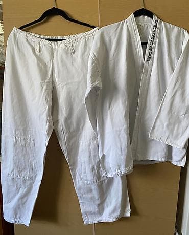 Ağ rəngli kimono dəsti 2 hissədən ibarət: üst və şalvar Material