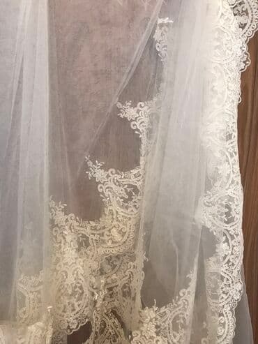 Очень красивая и дорогая фата, покупалась за 250 ман. В отличном